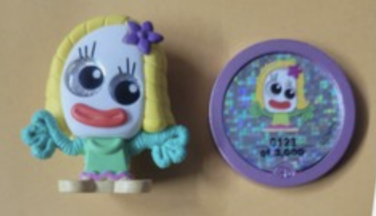 Karen Beverly with Numbered Collector Coin from Toy Story
